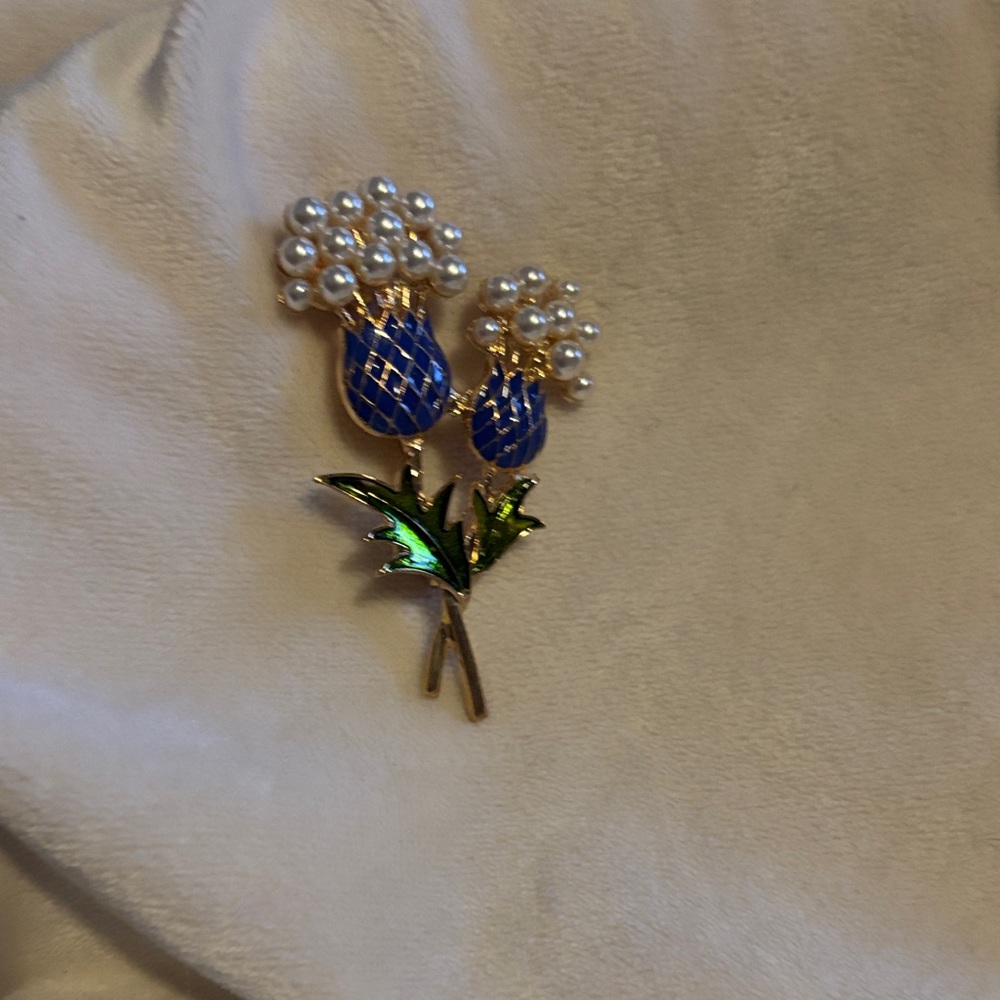 Elegant Blue and Gold Floral Brooch